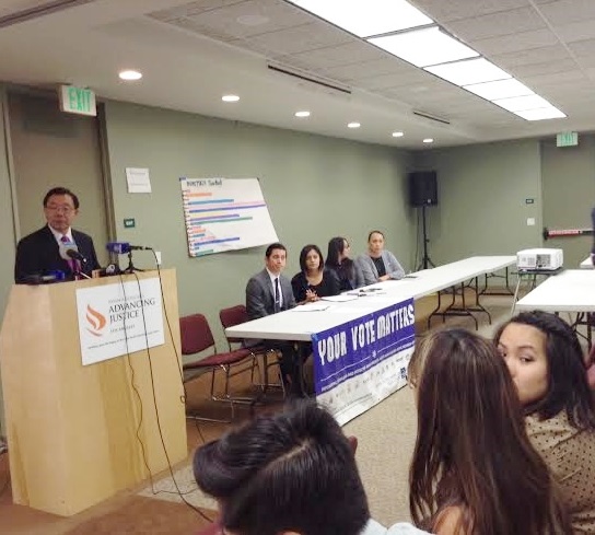 Executive Director Stewart Kwoh presents Asian Americans Advancing Justice-LA's report on the  growing power of Asians and Pacific Islanders in the polls.  Seated from left: Dan Ichinose, Project Director of Demographic Research Project; Tanzila Ahmed, Voter Engagement Manager;  Alisi Tulua of Empowering Pacific Islander; and Jacqueline Wu, Orange County Asian and Pacific Islander Community Alliance. Photo by Dante Ochoa/TheFilAmLA 