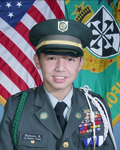 Robert Harraka Jr. graduates with the title of Regimental Commander, the highest rank in the military program  