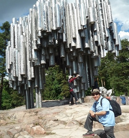 The author visiting Helsinki's Sibelius Park, which is an attractive monument of 527 steel pipes melded together in honor of Finnish composer Jean Sibelius. His classical music of the late Romantic period is still played in many concert halls today.   