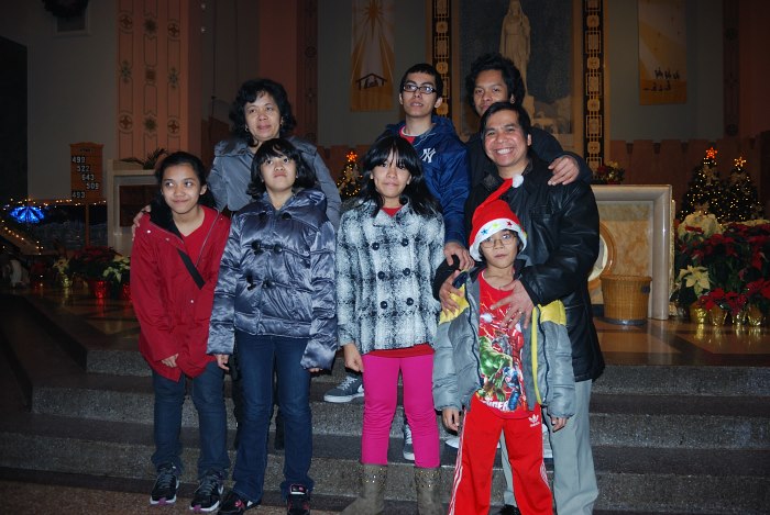 Christmas evening mass for the Pamolarco family at the Our Lady of Lourdes Church in Manhattan 