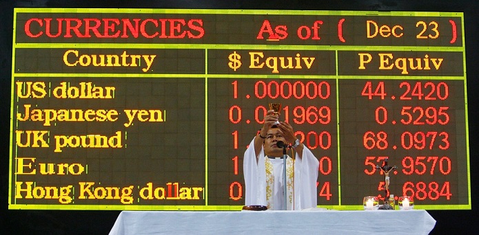 Philippine priest offers mass for traders at the PSE trading floor