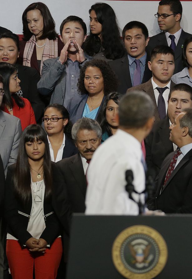 President Obama turns around to face reported ‘heckler’ Korean immigrant student Ju Hong.