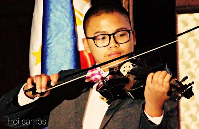 Violin prodigy Ryan Ramos plays three other musical instruments. Photo by Troi Santos
