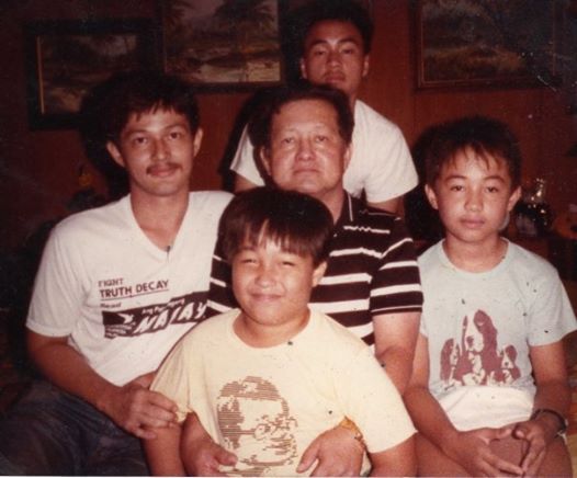 With my dad and my brothers in this photo taken in 1984. I took this one using a timer. 