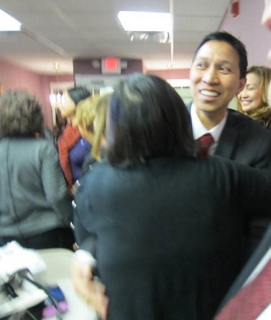 Arvin gets a congratulatory hug from PACCAL founder Linda Mayo 