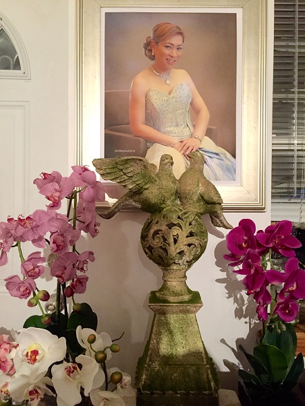 Orchids and a pair of doves adorn the Love Corner  in Chelle’s home.