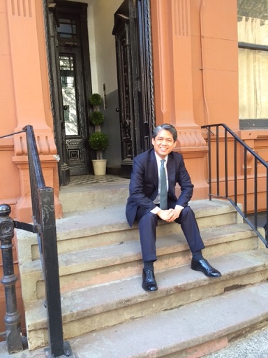 In front of his apartment building in the West Village where he met his wife: ‘We met on this stoop.’