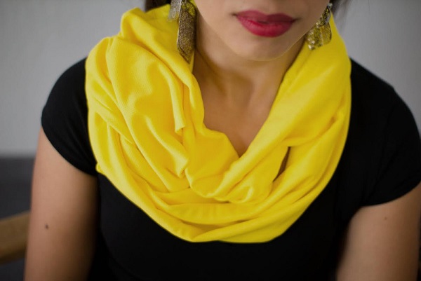 A bright yellow scarf from her designer collection 