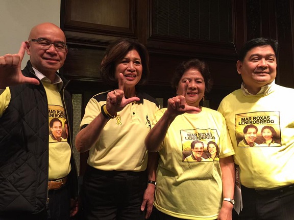 Mar Roxas partisans led by Loida Nicolas Lewis (2nd from left) flash the L sign, wear yellow. From left, Jerry Sibal, Dr. Angie Cruz and Edwin Josue.