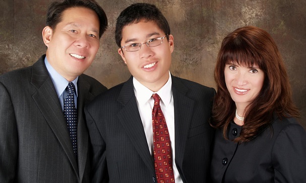 With husband Mac and son Miguel: ‘Mac is the visionary, I’m just the sales person.’   