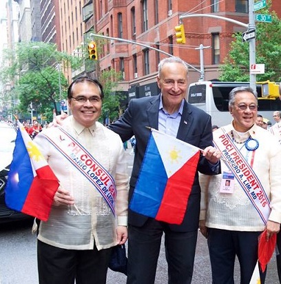 N.Y. Senator Charles Schumer attends the  June 5  Philippine Independence Day Parade on Madison Avenue. He is shown here with Consul General Mario de Leon Jr. (left) and parade organizer Dr. Prospero Lim. Photo by Boyet Loverita