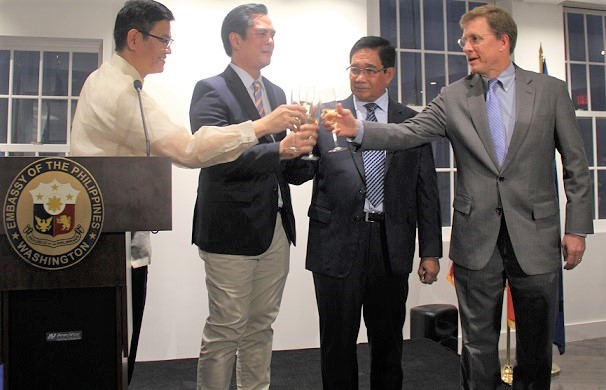 From left, Philippine Embassy Chargé d’Affaires ad interim Minister Patrick Chuasoto, Presidential Communications Secretary Jose Ruperto Martin Andanar, National Security Adviser Hermogenes Esperon, Jr.; and US Deputy Assistant Secretary of State W. Patrick Murphy offer a toast to the enduring ties between the Philippines and the United States at a reception marking the inauguration of Donald  Trump, held at the Philippine Embassy Chancery on January 19.