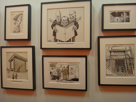 A wall of award-winning editorial cartoons