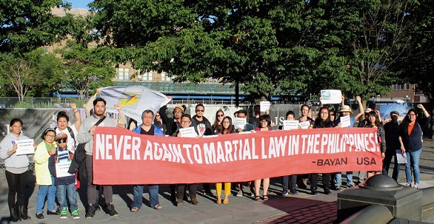 Unfurling ‘no to martial law’ banner