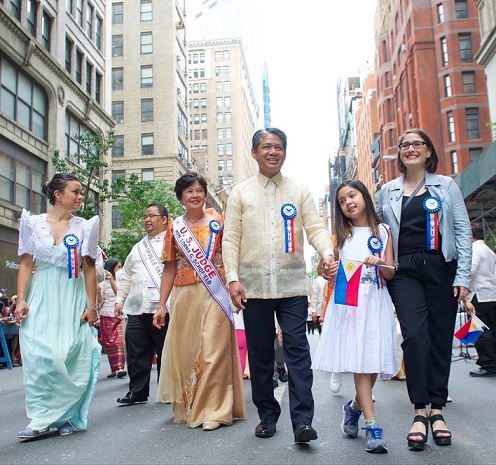 Federal Judge Lorna Schofield and New York Power Authority CEO Gil Quiniones march with their families