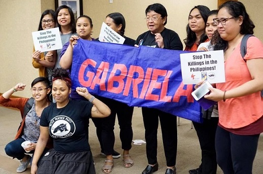  The author (far right) and other Gabriela activists with former Social Welfare Secretary Judy Taguiwalo (fourth from right). Photo by Lambert Parong