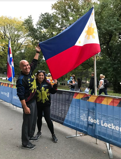 With husband Tony Sardillo raising the Philippine colors