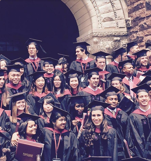 Graduating from Harvard; Edzyl’s to the left.
