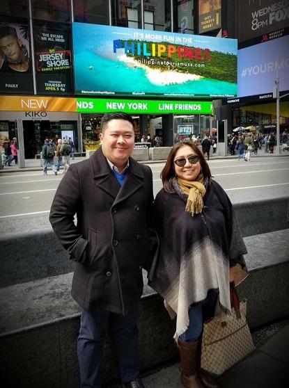 Tourism Attaché Susan del Mundo and PAL Area Manager for New York Josh Vasquez in Times Square with the DOT billboard blinking in the background. Facebook photo