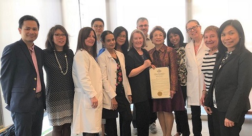 Short and simple ceremony at the JPMorgan Chase Wellness Center attended by Cora’s supervisors, co-workers, and Asian American community advocates.