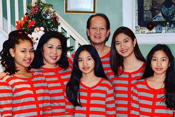Audie and Mary Rose Trinidad with their four daughters. Mary Rose is the lone survivor. Photo: GoFundMe page 