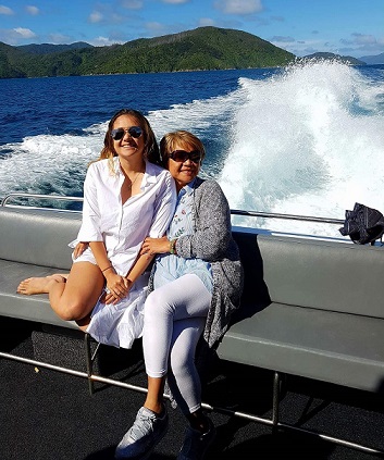 The author and her Ilocana mother enjoying the ocean waves in Sydney