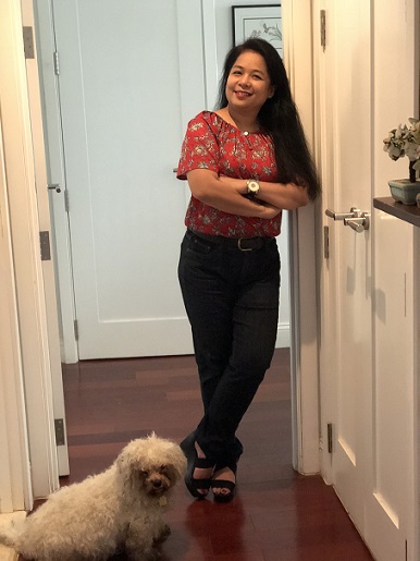 At her Prospect Park home she shares with eight dogs. Meet rescue dog Snowflake who hogged the photo shoot. The FilAm Photo