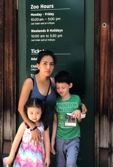 With children Tristan and Lauren at the Queens Zoo.