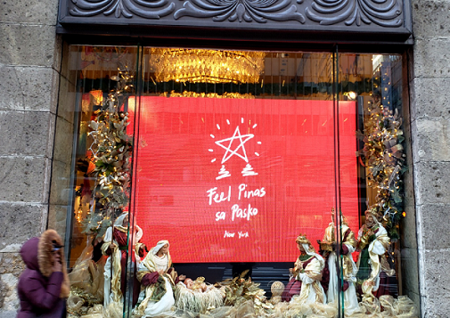 The large window  showcases the nativity scene. 