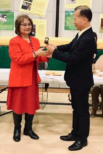 Symbolic succession ceremony, with Immediate Past President Lito Pernia passing the gavel to President Rosalinda Rupel.